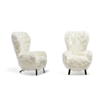 GUELFO FUR Faux fur wraps the wingback and the footstool