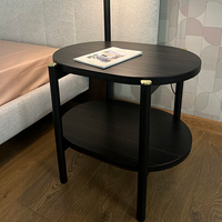 MADAME Bedside table with an oval top