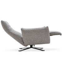 POLSE Upholstered tilting and swivelling armchair with metal base