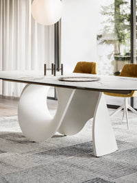 SEASHELL Table with an elliptical non-extending top and central base in cement, FE