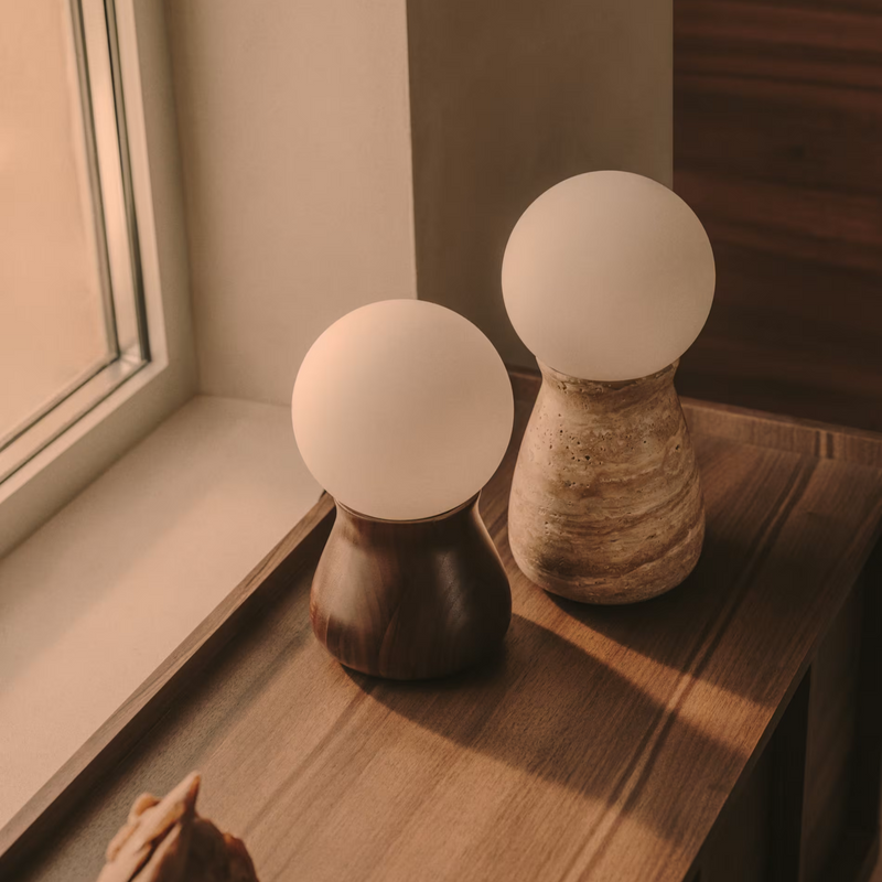 OKENI table lamp made of travertine and glass