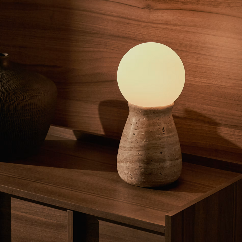 OKENI table lamp made of travertine and glass