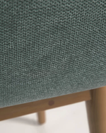 KONNA chair with solid ash wood legs in a dark finish