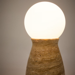 OKENI table lamp made of travertine and glass