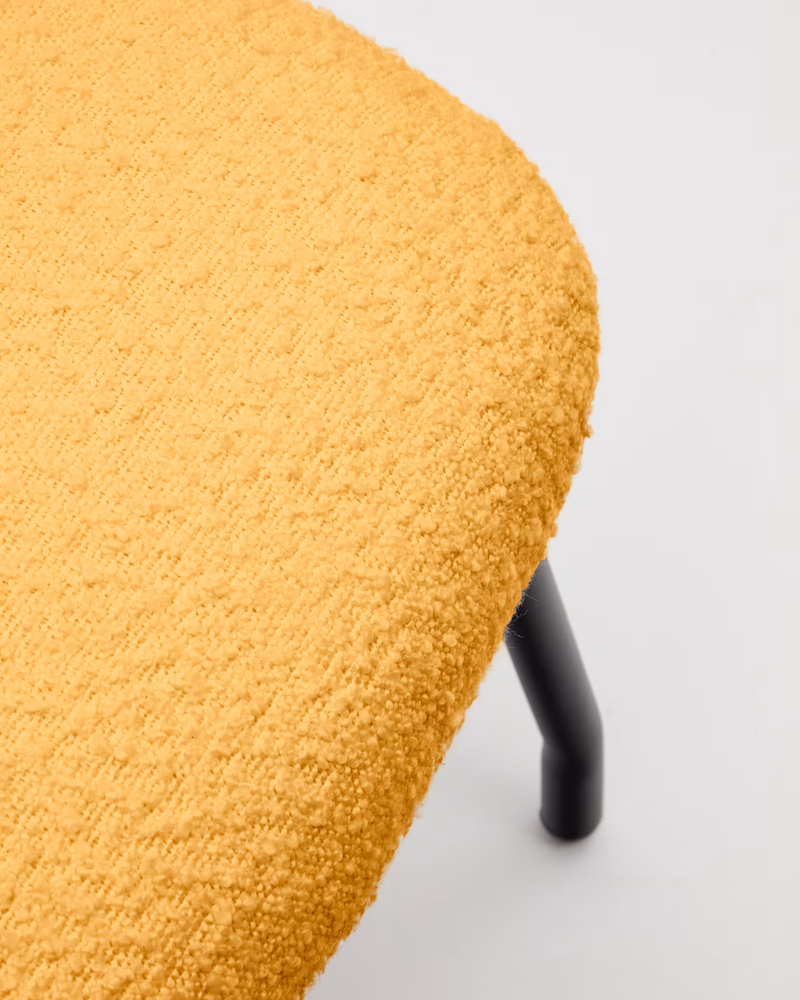 BELINA Footrest in mustard bouclé and steel with black finish