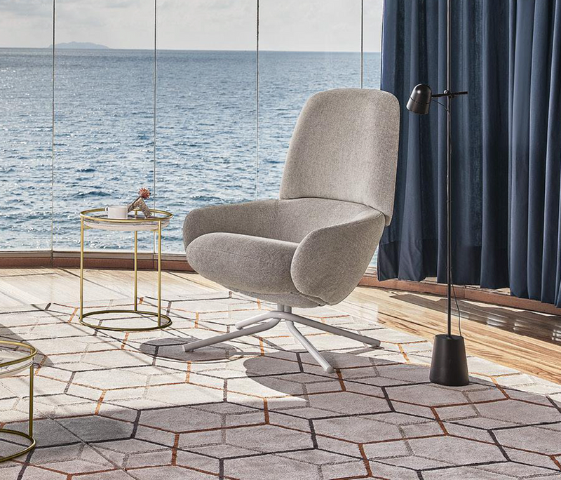 COMFY Upholstered tilting armchair with metal base