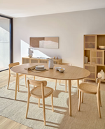 OQUI Ovalni stol na razvlačenje s hrastovim furnirom i nogama od punog drva, Ø 120 (200) x 120 cm