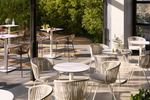 DINA Round outdoor table in white with metal legal in a painted black finish, Ø 68x70 cm
