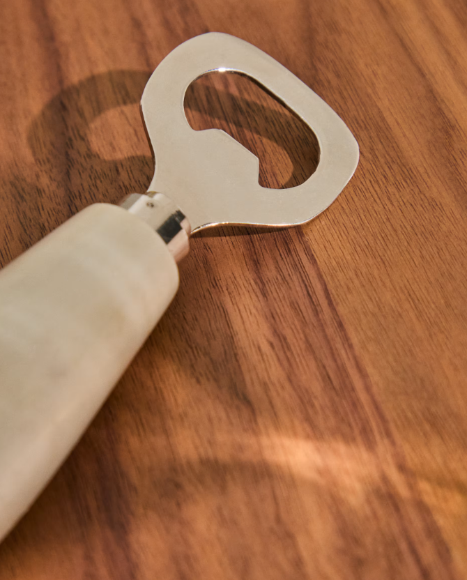 NIRA Opener in black and white marble