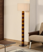 MAVRAN floor lamp with brown and mustard ceramic base and cotton lampshade