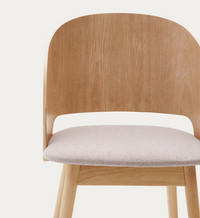 SEONA Chair with a natural finish and beige chenille