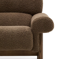 NEMA armchair in taupe bouclé with solid ash wood legs in a walnut finish FSC 100%