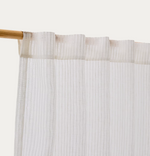 RILA curtain with detailed striped structure in off-white