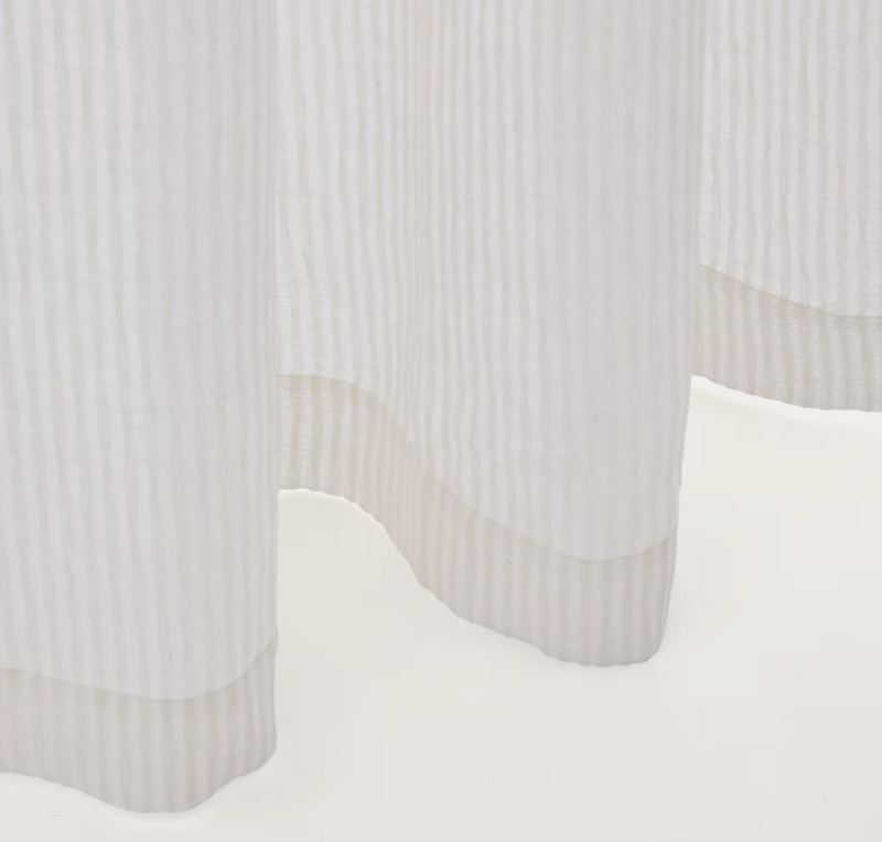 RILA curtain with detailed striped structure in off-white