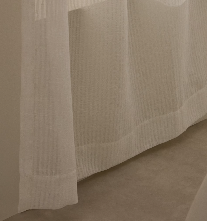 RILA curtain with detailed striped structure in off-white