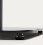 DINA Round table in natural finish melamine with metal leg in a painted black finish, Ø68x70cm