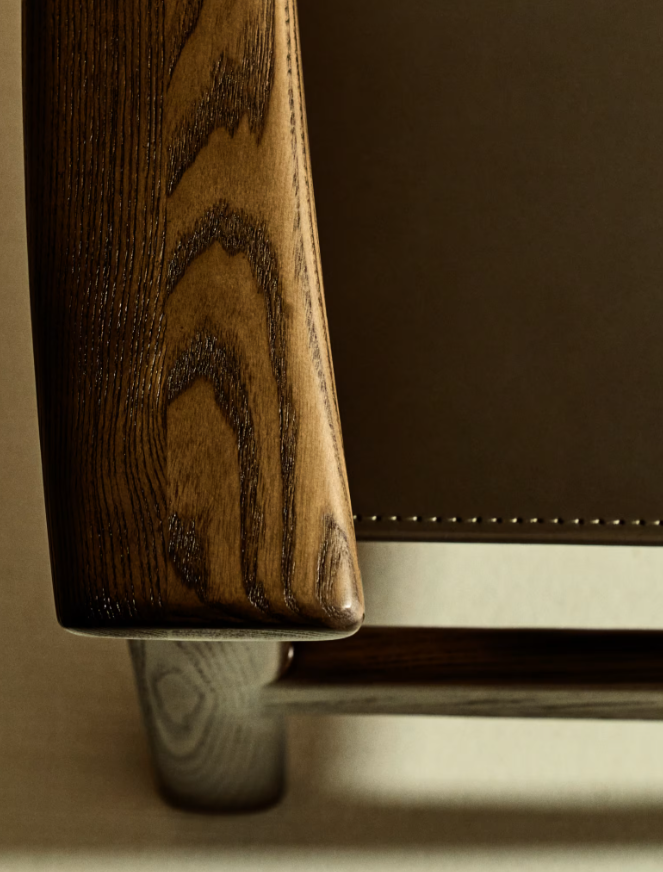 JAN Chair made of dark brown recycled leather fibres and FSC 100% solid ash wood with walnut-coloured finish