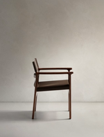 JAN Chair made of dark brown recycled leather fibres and FSC 100% solid ash wood with walnut-coloured finish