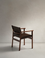JAN Chair made of dark brown recycled leather fibres and FSC 100% solid ash wood with walnut-coloured finish
