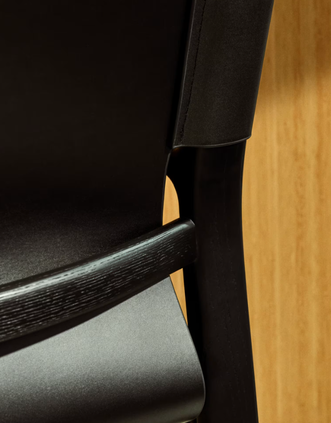 JAN Chair made of black recycled leather fibres and FSC 100% solid ash wood with black finish
