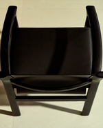 JAN Chair made of black recycled leather fibres and FSC 100% solid ash wood with black finish