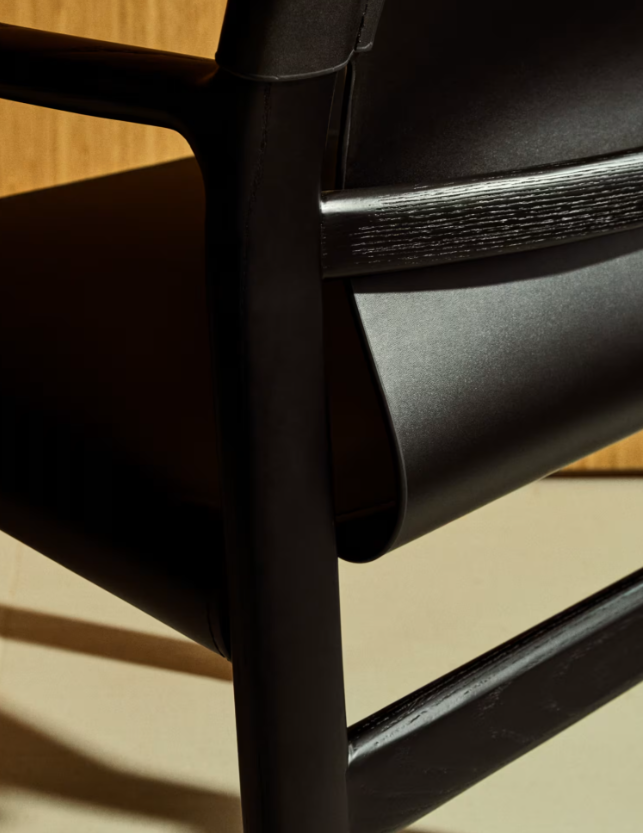 JAN Chair made of black recycled leather fibres and FSC 100% solid ash wood with black finish