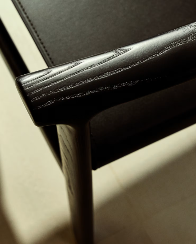 JAN Chair made of black recycled leather fibres and FSC 100% solid ash wood with black finish