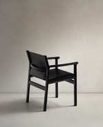 JAN Chair made of black recycled leather fibres and FSC 100% solid ash wood with black finish