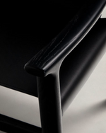 JAN Chair made of black recycled leather fibres and FSC 100% solid ash wood with black finish