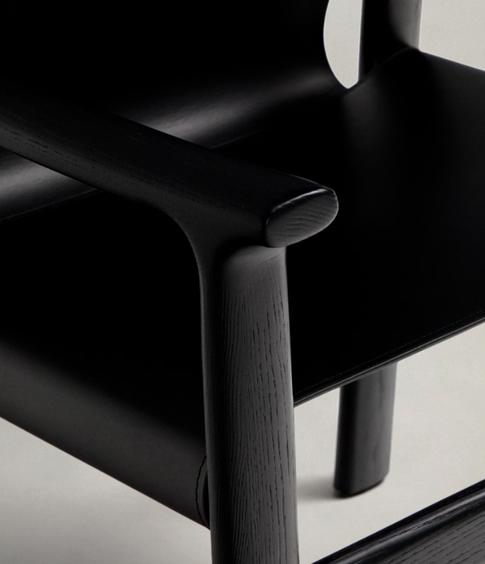 JAN Chair made of black recycled leather fibres and FSC 100% solid ash wood with black finish