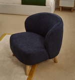 ULIT armchair in blue-grey chenille with solid beech wood legs in a natural finish