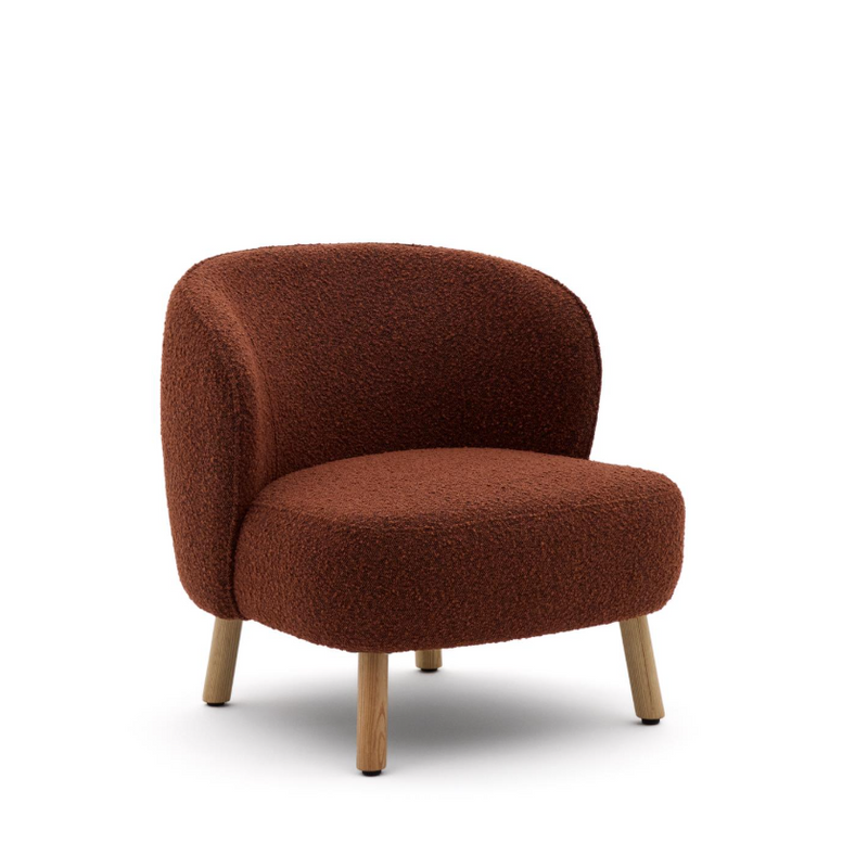 ULIT armchair in terracotta bouclé with solid beech wood legs in a natural finish