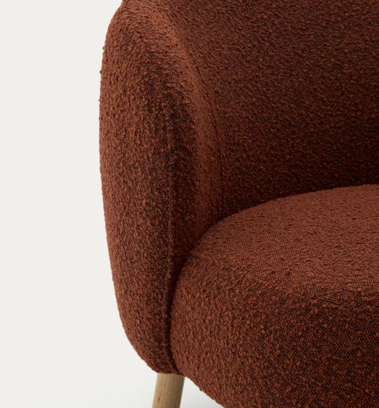 ULIT armchair in terracotta bouclé with solid beech wood legs in a natural finish