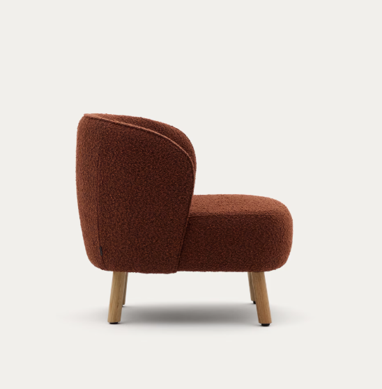 ULIT armchair in terracotta bouclé with solid beech wood legs in a natural finish