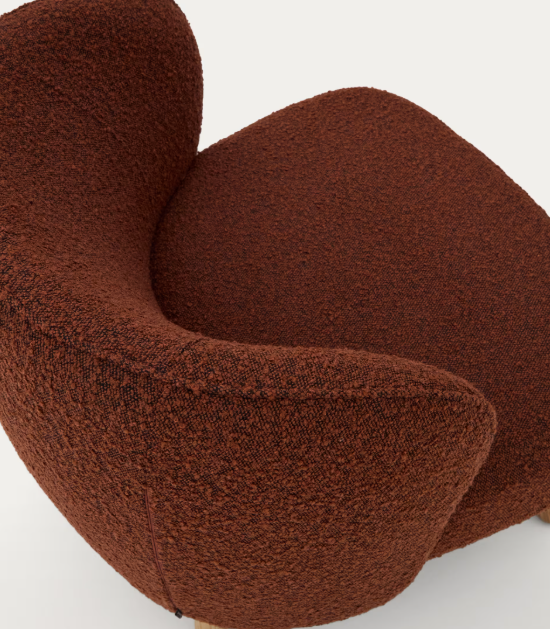 ULIT armchair in terracotta bouclé with solid beech wood legs in a natural finish