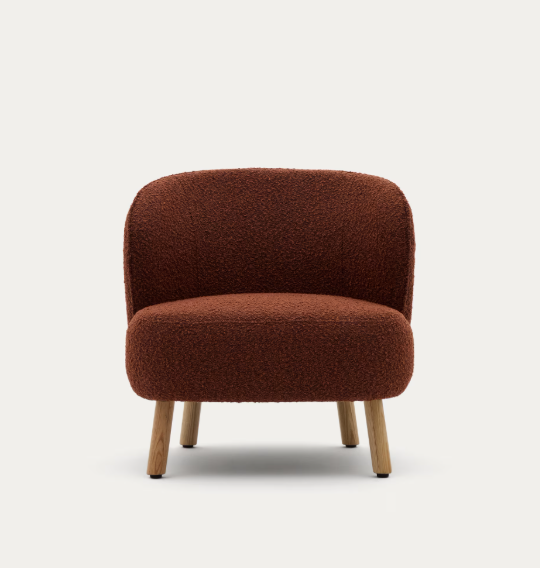 ULIT armchair in terracotta bouclé with solid beech wood legs in a natural finish