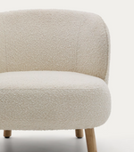 ULIT armchair in white bouclé with solid beech wood legs in a natural finish