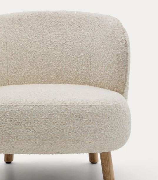 ULIT armchair in white bouclé with solid beech wood legs in a natural finish
