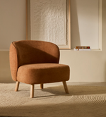ULIT armchair in terracotta chenille with solid beech wood legs in a natural finish