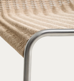 TAVARI Stackable chair in beige synthetic rope cord and brushed-effect stainless steel.