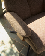 TORIEL Brown swivel armchair