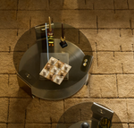 DOLVEN Coffee table in brown glass and brushed steel Ø80cm