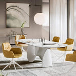 SEASHELL Table with an elliptical non-extending top and central base in cement, FE