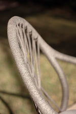 PETALE Hand-woven dining armchair with diamond pattern