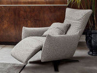 POLSE Upholstered tilting and swivelling armchair with metal base