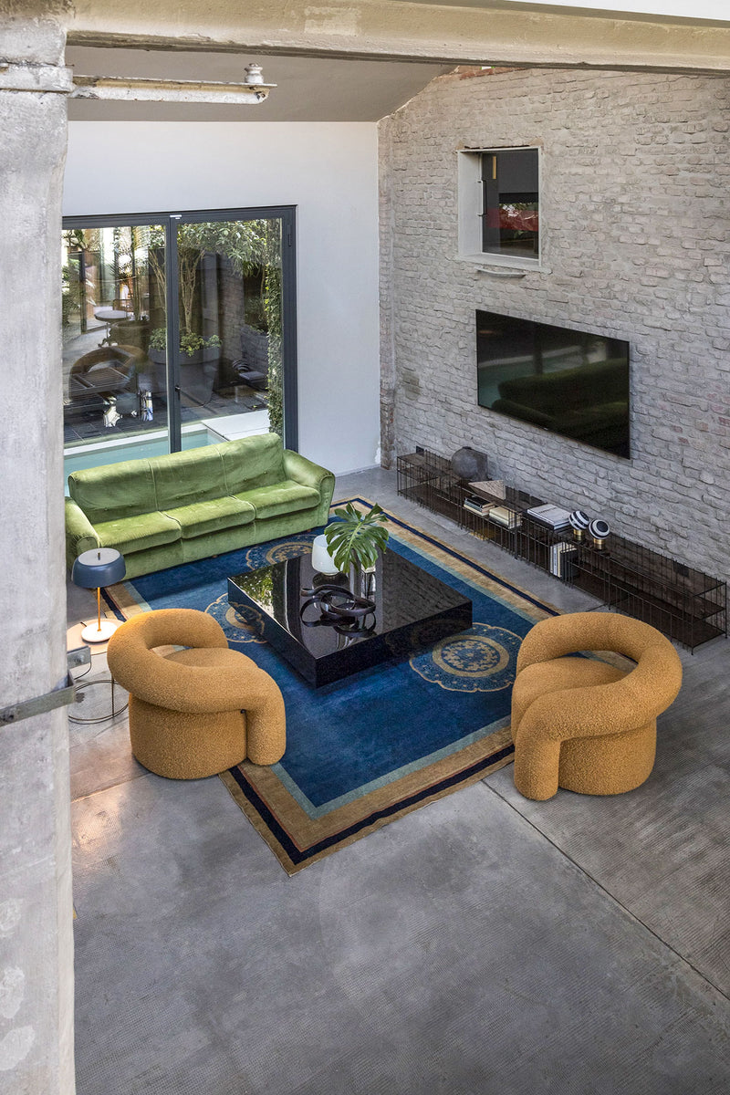 NORA Padded armchair with metal and curved wood structure