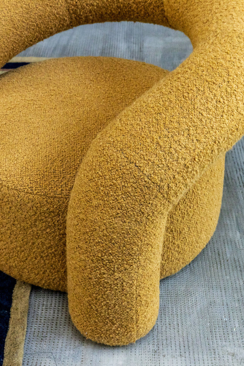 NORA Padded armchair with metal and curved wood structure