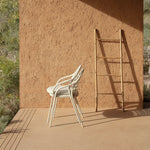 PETALE Hand-woven dining armchair with grid pattern