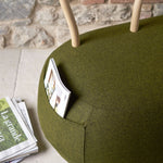 YUM YUM A soft padded pouf with a strong wooden backrest