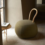 YUM YUM A soft padded pouf with a strong wooden backrest